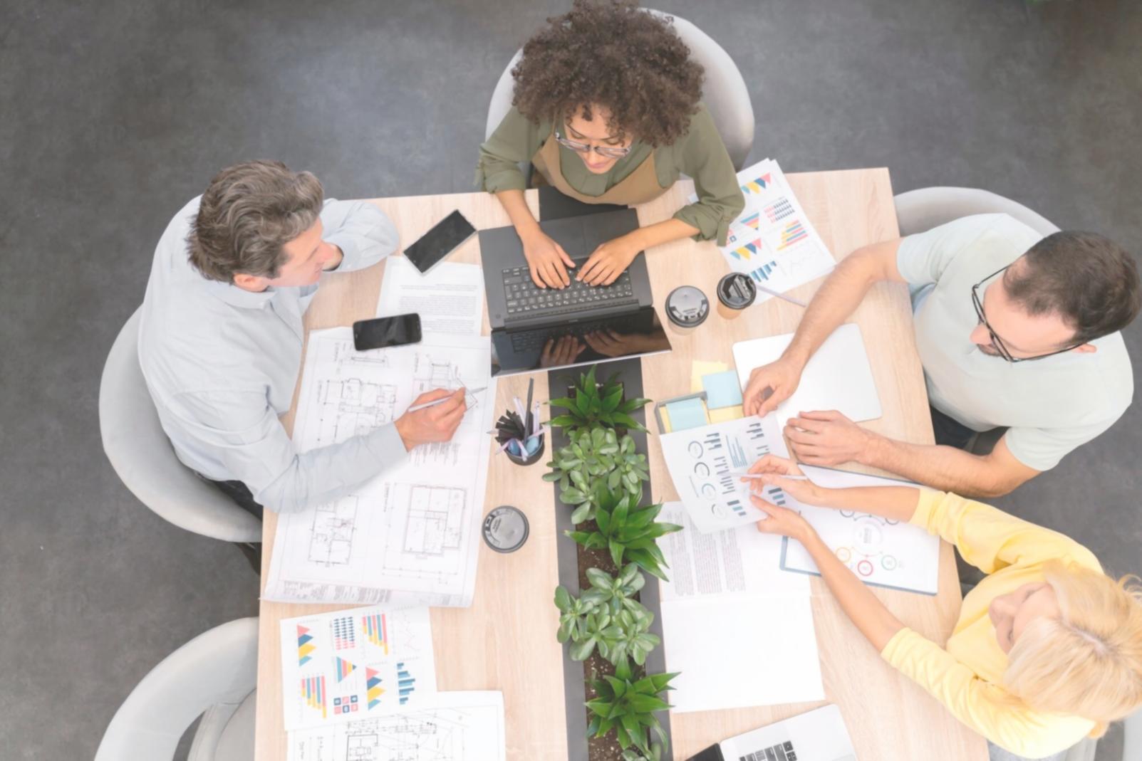 Collaborative workspace environment with entrepreneurs working together on venture building projects